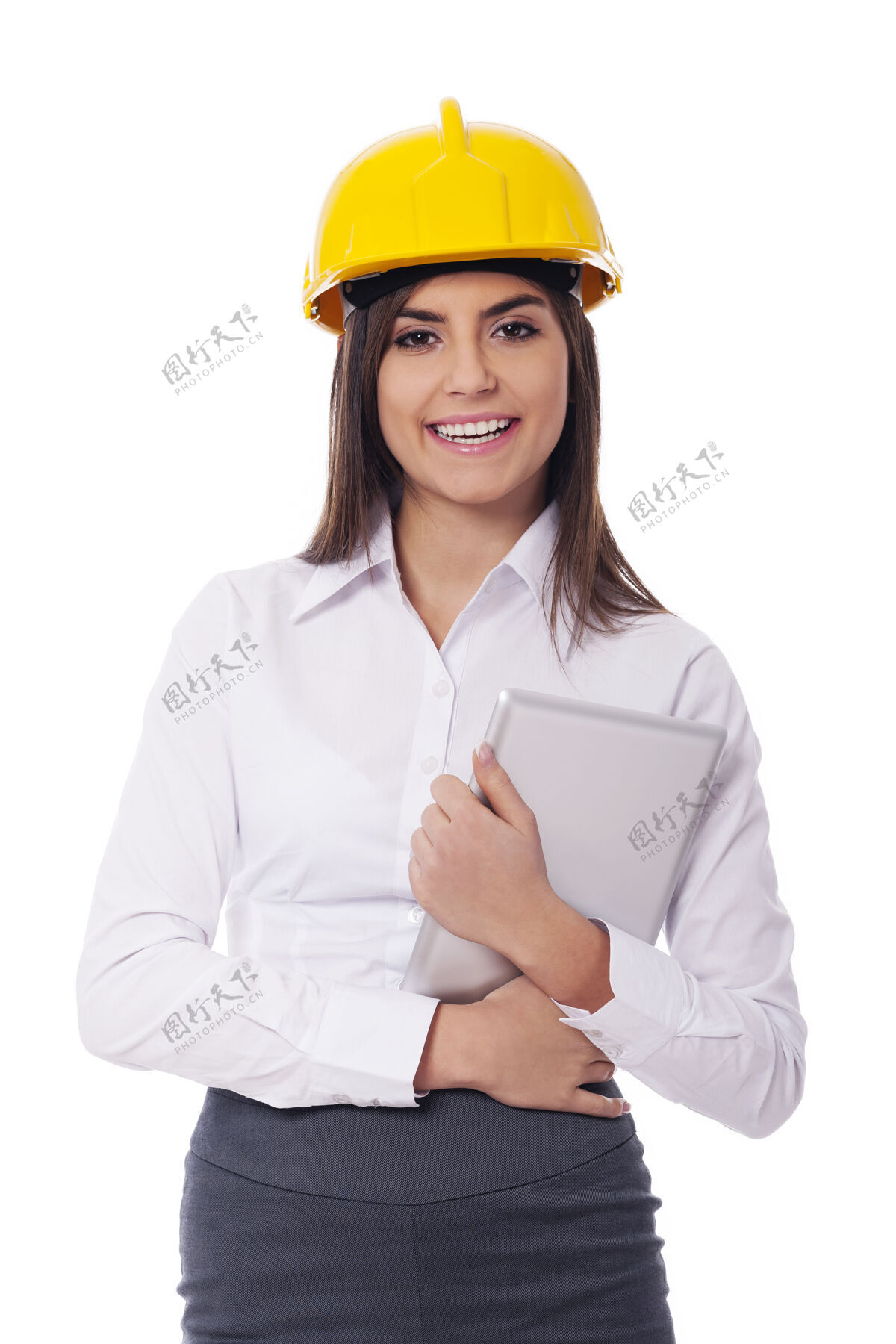 建筑戴着安全帽手持数字平板电脑的女商人商务人士黄色快乐