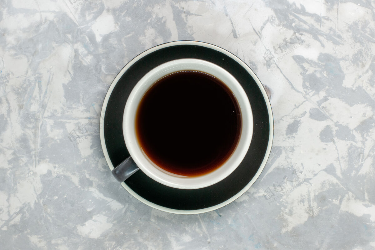 甜食顶视图茶杯内部茶杯和茶盘表面呈浅白色杯子茶茶碟