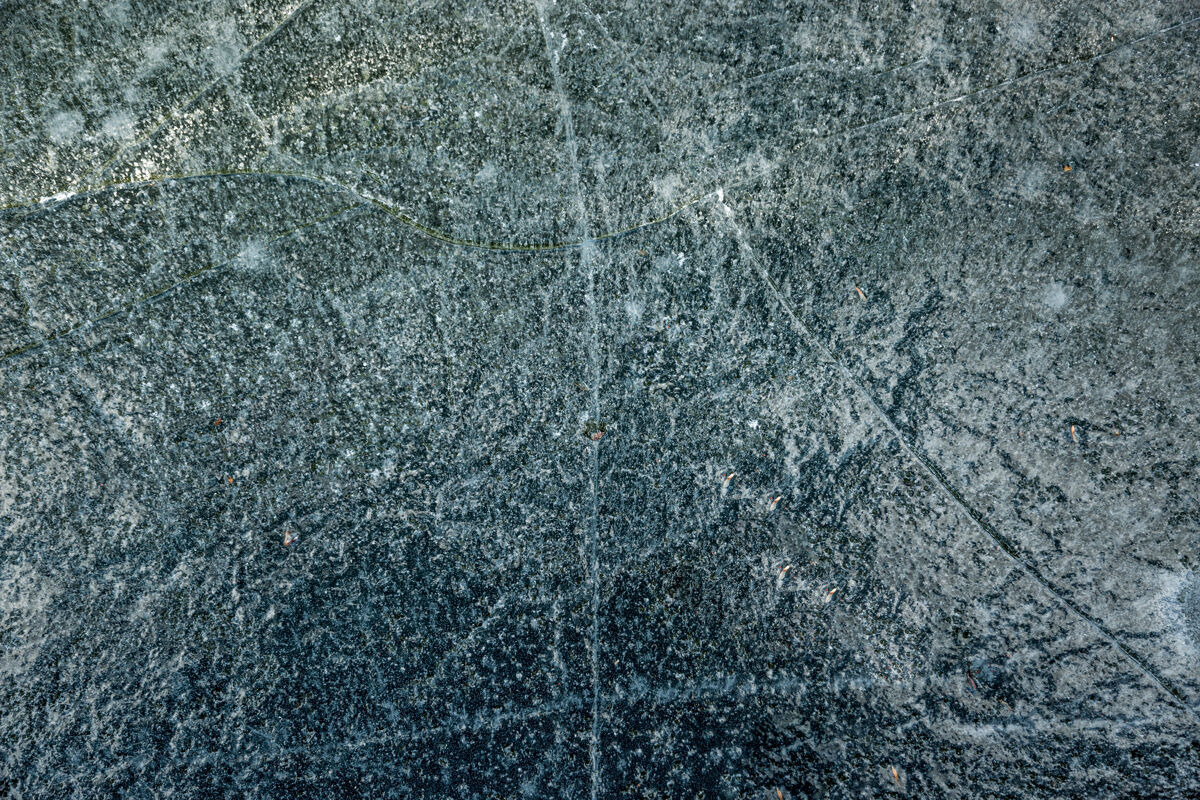 液体特写纹理的裂缝冰湖的背景冷霜清晰